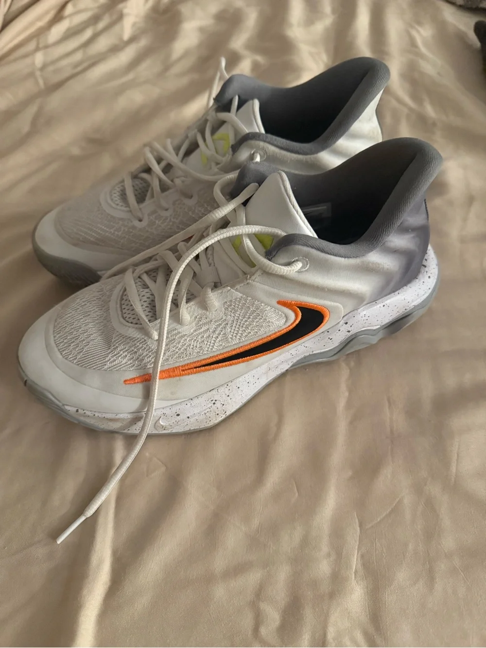 Nike Kids White Sneakers with Orange and Black Swoosh and Gray Collar